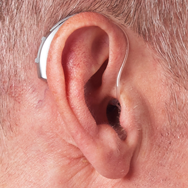 behind-the-ear-artificial-intelligence-hearing-aid-on-ear